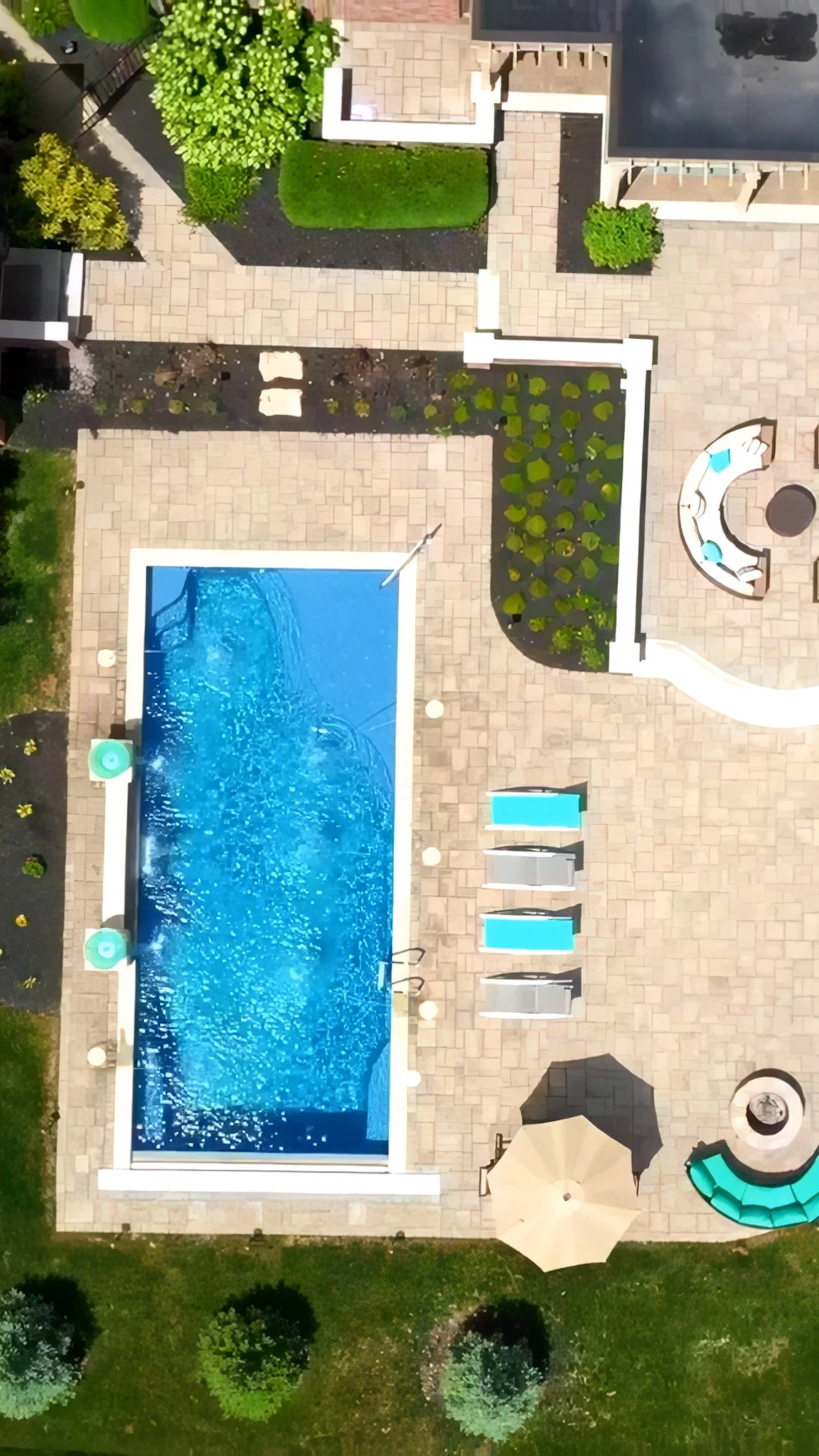 Finished custom pool and patio installation in a Suwanee GA estate neighborhood