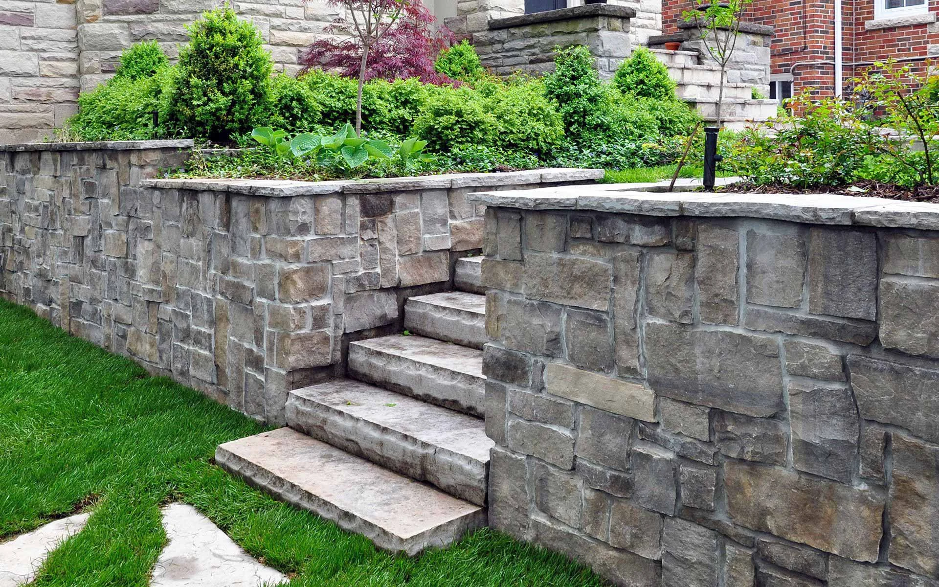 Hardscape design and construction project with integrated outdoor living zones in Forsyth County, GA