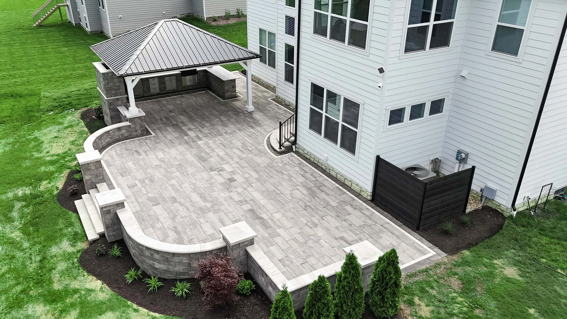 Installed paver patio with tight joints and clean border course in Cumming, GA