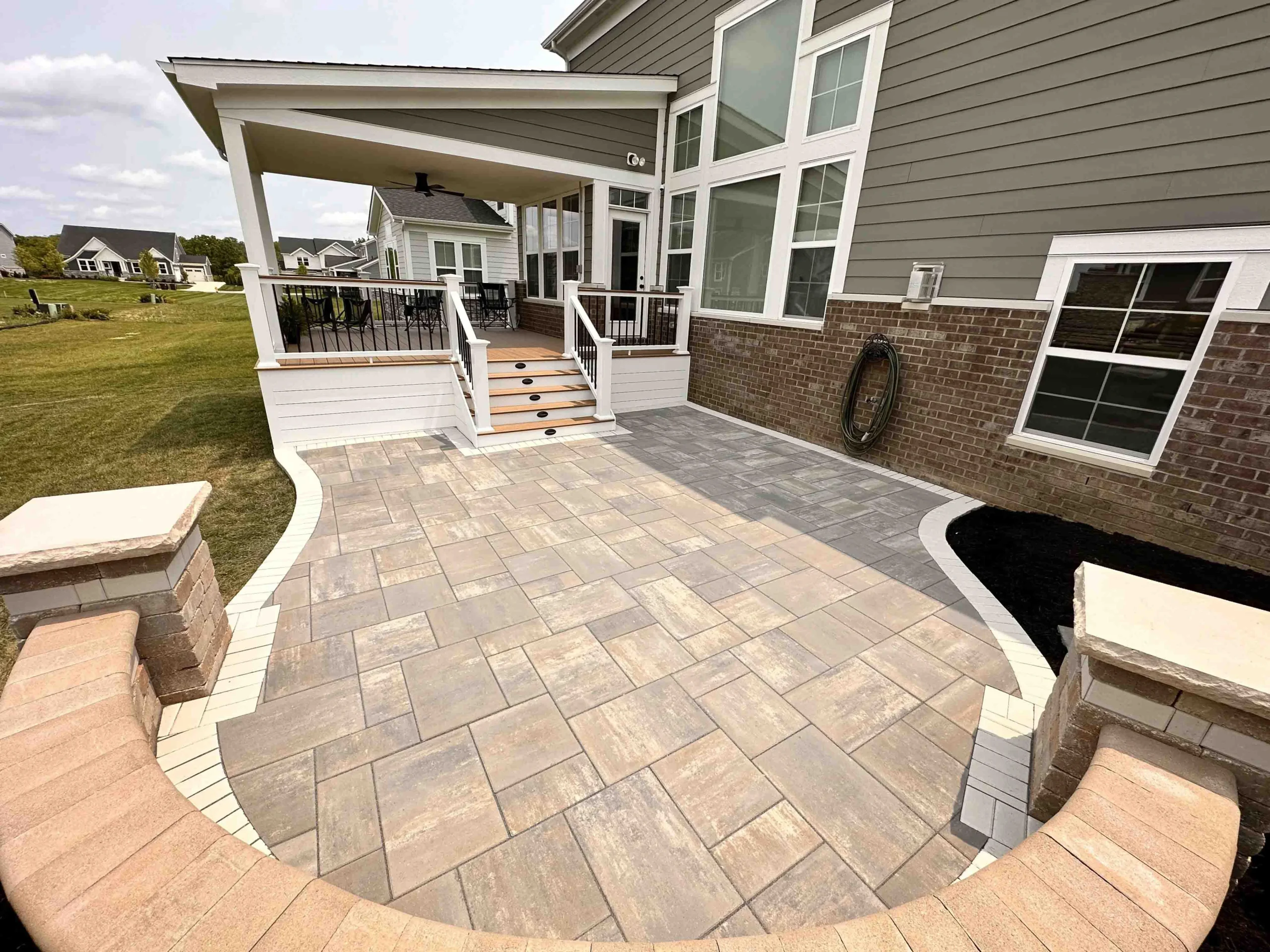 Paver patio field with engineered base and drainage detailing in Cumming, GA