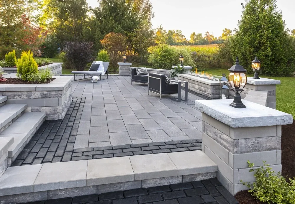 Completed paver patio with rigid edge restraint and polymeric sand joints on a Forsyth County, GA project