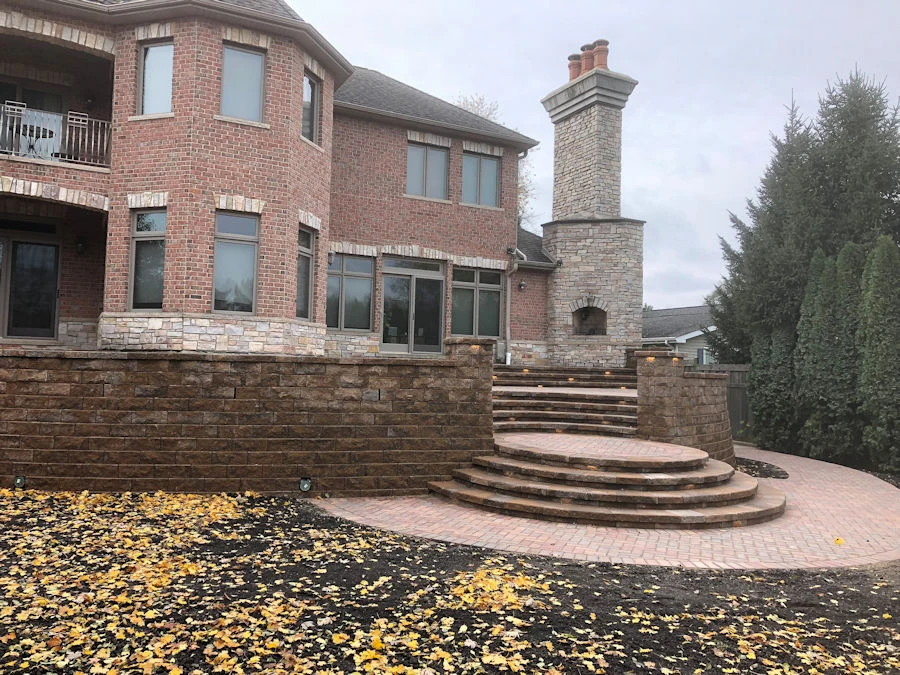 Travertine pool coping with paver deck and stepped tile detail on Clarkston GA pool remodel