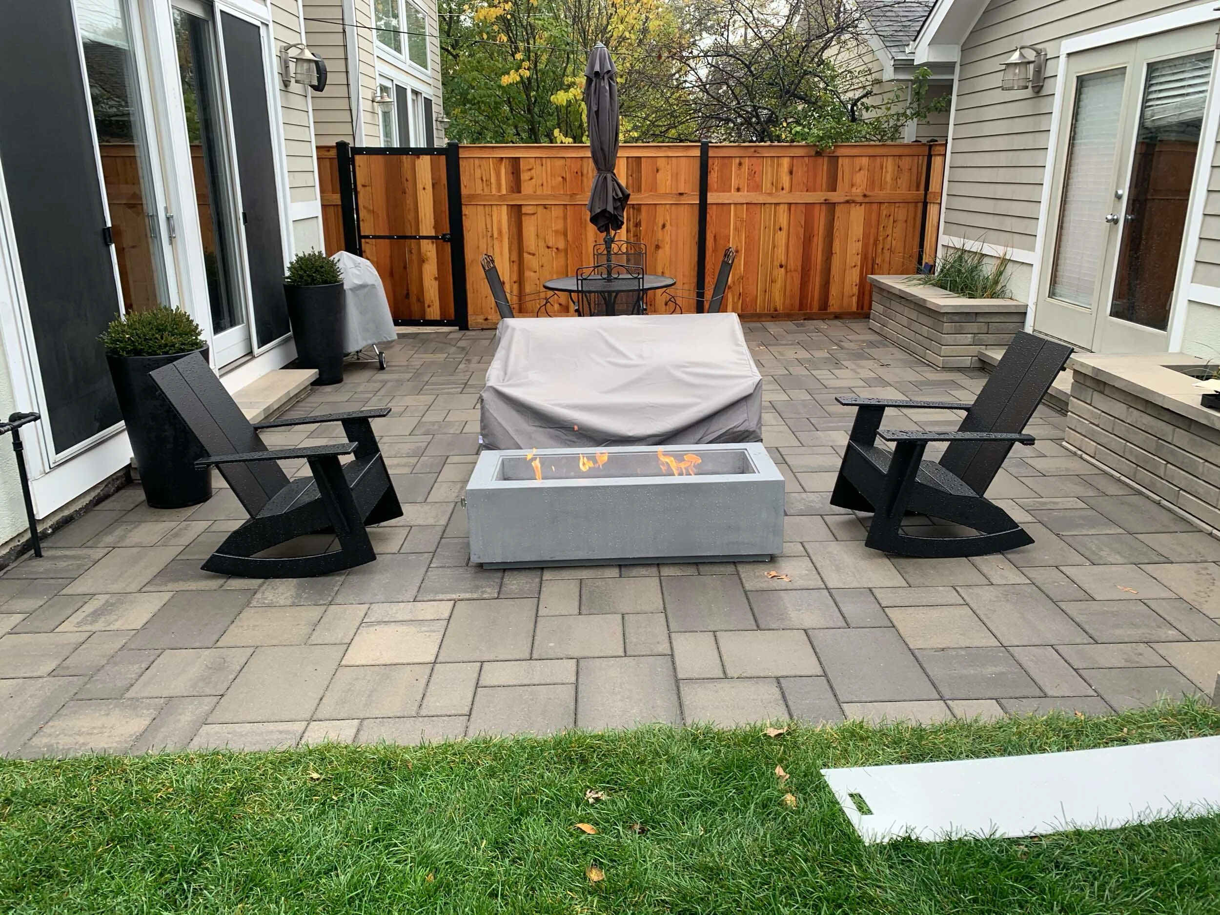 Completed paver pool deck with crisp joint lines and no haze, Cumming GA backyard