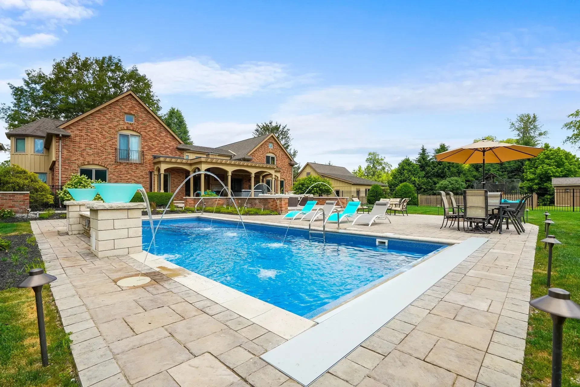 How Dawsonville’s Oak Canopy Changes Pool Deck Material Selection